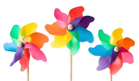 Toy windmills isolated on a white background.