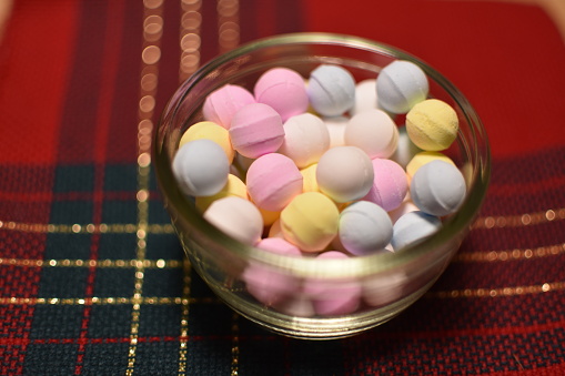 Close-up of ramune sweets in bowl on table
