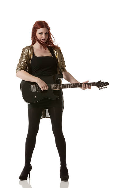 istock Attractive young woman playing a guitar 171268724
