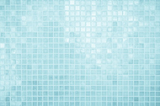 Tilled background texture made from an array of colorful artificial cubes