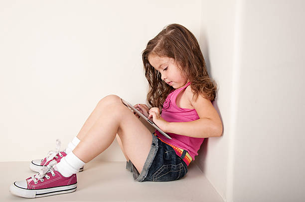 istock Cute Four Year Old Girl With Touch Screen Tablet 171269491