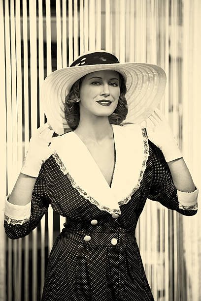 Old Hollywood.Female portrait Emulation of vintage style photography.Grain added for more film effect.See the Lightbox: formal glove stock pictures, royalty-free photos & images
