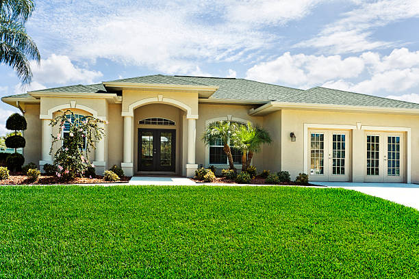 istock New House with a two car garage sunny beautiful day 171271113