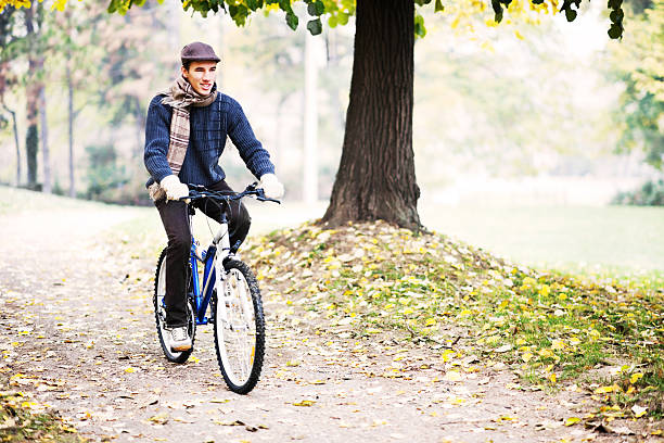 istock Cheerful man riding a bike. 171271552