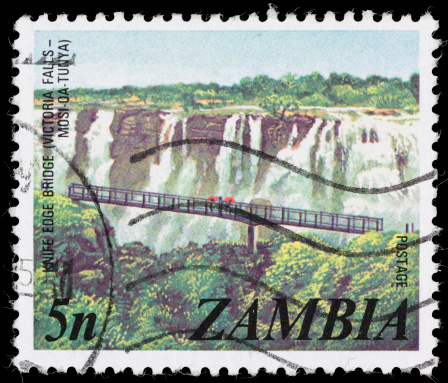 A 1975 Zambia postage stamp with an illustration of Victoria Falls.