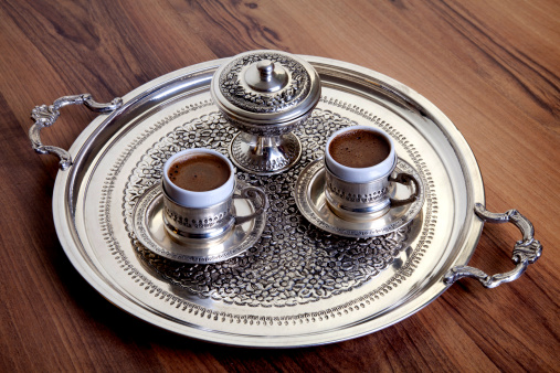Turkish coffee cup in tray.wood background