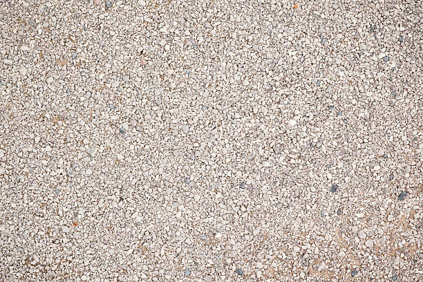 Old gray asphalt. Top view. Close-up. Background. Texture.