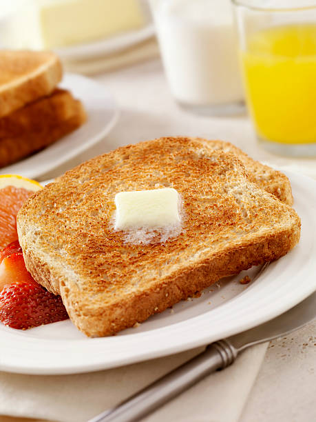istock Whole Wheat Toast with Melting Butter 171273808