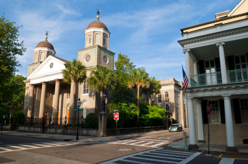 Buildings at the intersection of Tradd and Meeting Streets in downtown Charleston, South Carolina. The building on the left is First (Scots) Presbyterian Church. established in 1731