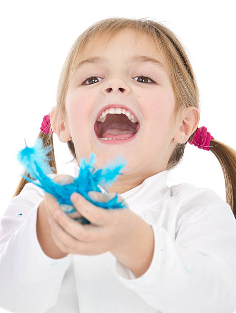 istock Cute little girl with feathers 171274511