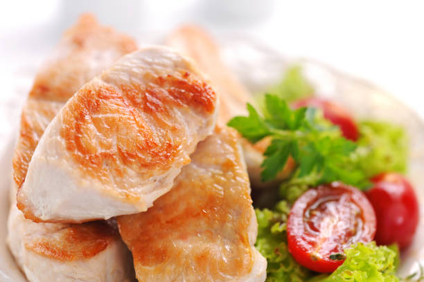 istock Grilled turkey steak with potatoes,asparagus and salad 171274624