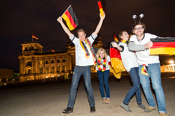 German football fans German football fans cheering in Berlin european football championship stock pictures, royalty-free photos & images