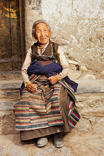istock Tibetan woman with rosary 171275698