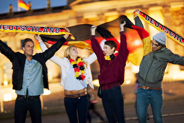 istock Soccer Fans Cheering in Berlin 171276098