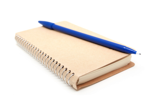 Notebook and a felt-tip pen