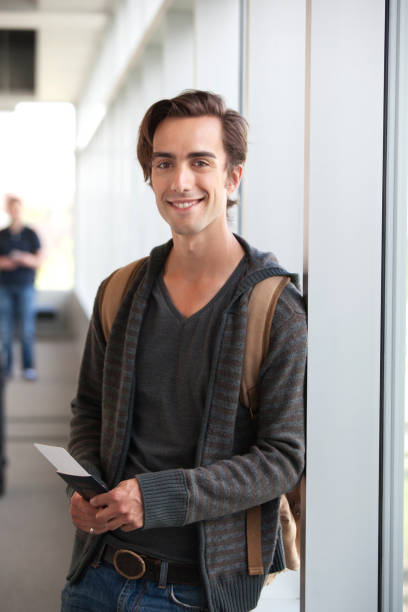 istock Handsome Traveller with Backpack Holding Passport and Boarding Pass 171276644