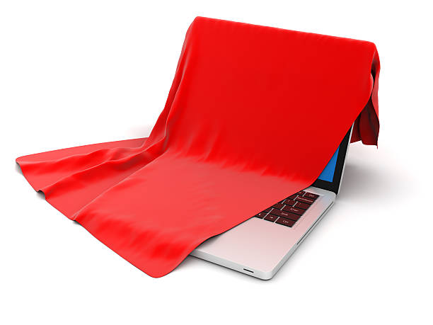 Laptop under cover stock photo