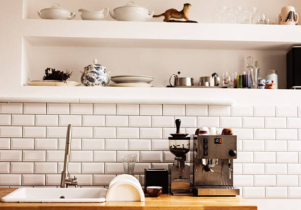 kitchen interior coffee maker in kitchen interior coffee maker in kitchen stock pictures, royalty-free photos & images