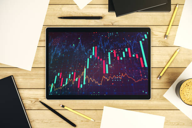 istock Modern digital tablet monitor with abstract creative financial chart, research and analytics concept. Top view. 3D Rendering 1712771203