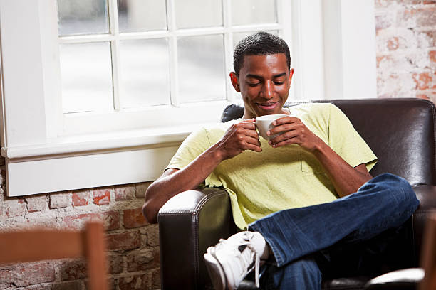 istock Young man in cafe having cup of coffee 171277277