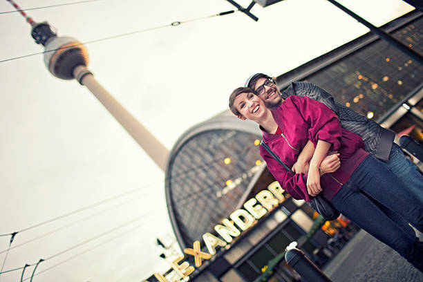Young couple hugging in alexanderplatz