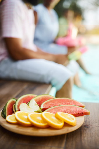 Slices of delicious ripe seedless watermelon on white background