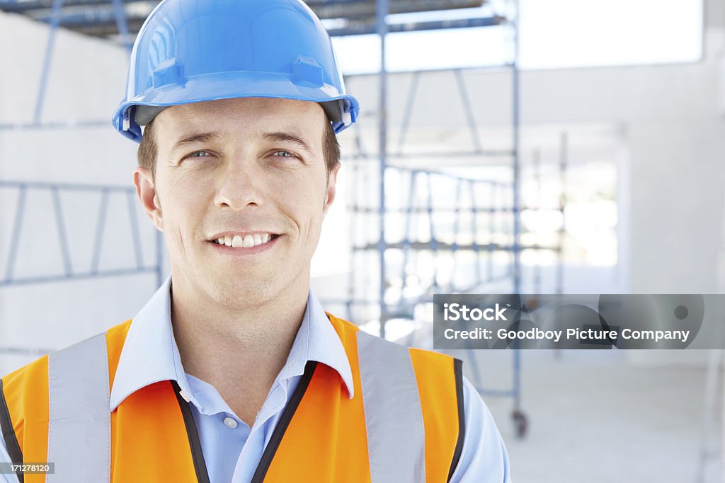 He has the enthusiasm of youth Portrait of a young engineer standing on a construction site Building Contractor Stock Photo
