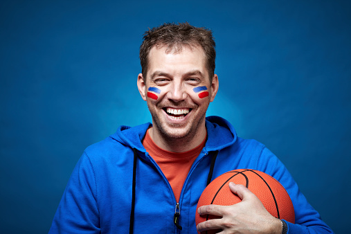 Portrait of a basketball fan smiling at camera