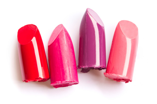Lipstick bullet tips in a row.