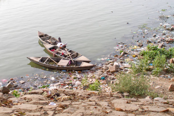 Boats on the Yamuna river, New Delhi stock photo