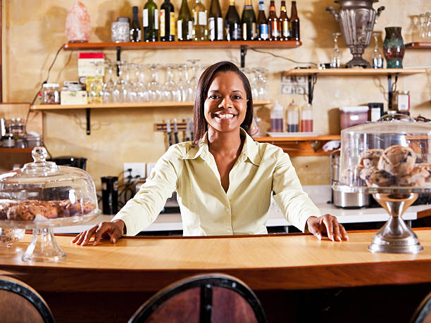 istock Waitress behind counter in restaurant 171280380
