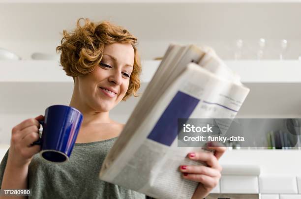 Young Woman With Coffee And Newspaper Stock Photo - Download Image Now - Newspaper, Reading, Women