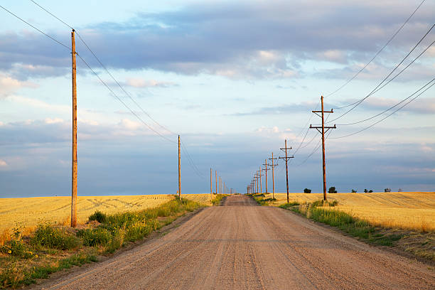 Road Through Rolling Hills and Prairie stock photo