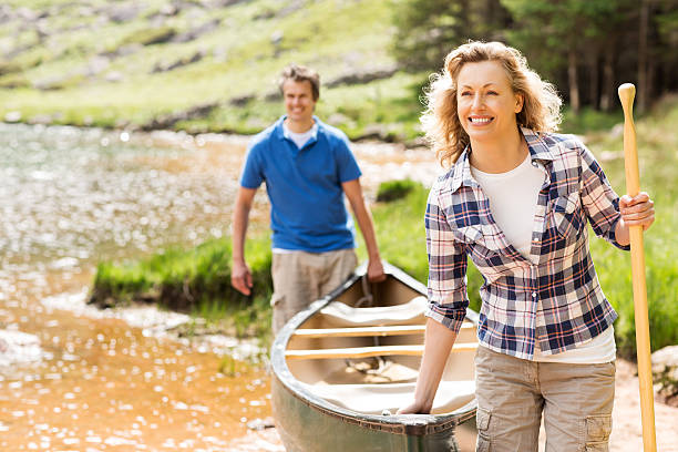 istock Couple Carrying a Boat 171281459