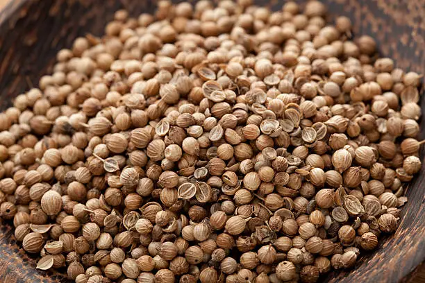 Coriander Seed in wooden bowl