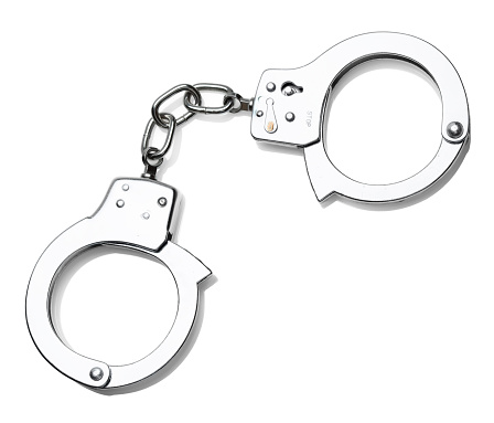 Close-up shot of handcuffs, isolated on white. (5D Mark II, Adobe RGB)