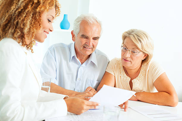 istock Senior Couple Meeting with Financial advisor. 171282070