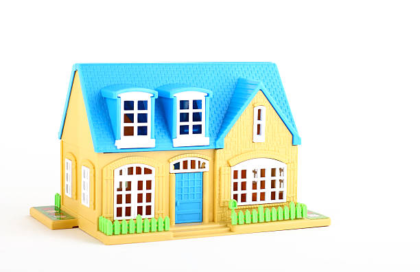 A cartoon image of a blue and yellow house House playhouse stock pictures, royalty-free photos & images