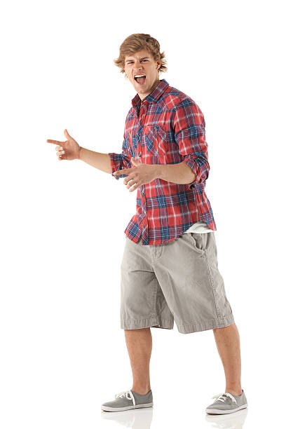 Man shouting and pointing to the side