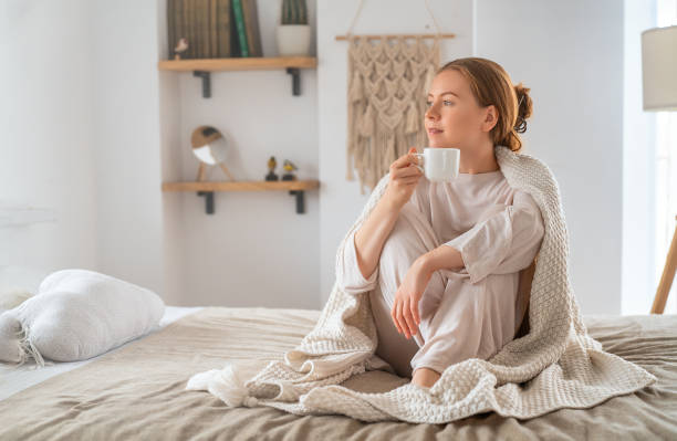 istock woman enjoying a cup of coffee 1712829458