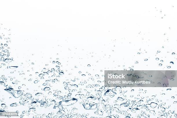 Blue Air Bubbles Rising In Clear Fresh Water Stock Photo - Download Image Now - Bubble, Water, Backgrounds