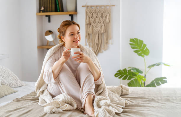 istock woman enjoying a cup of coffee 1712831788