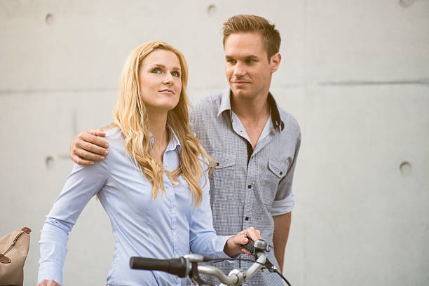 istock Cheerful young couple with bike 171283271