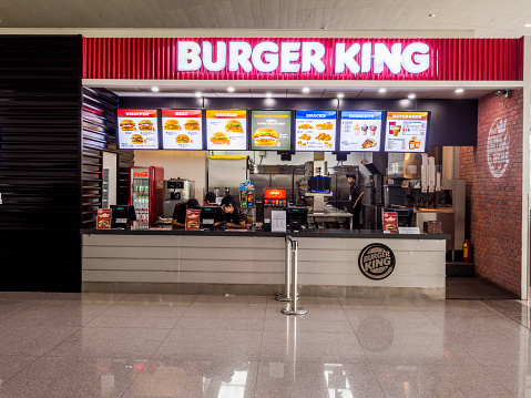 Tokyo, Japan - May 30 , 2023 : A man enters the Burger King restaurant in Asagaya, Suginami Ward, Tokyo, Japan.
