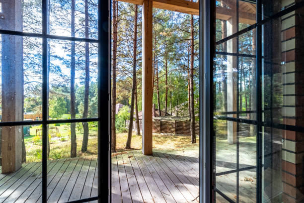 istock Looking through the window, pine forests at sunrise 1712842793