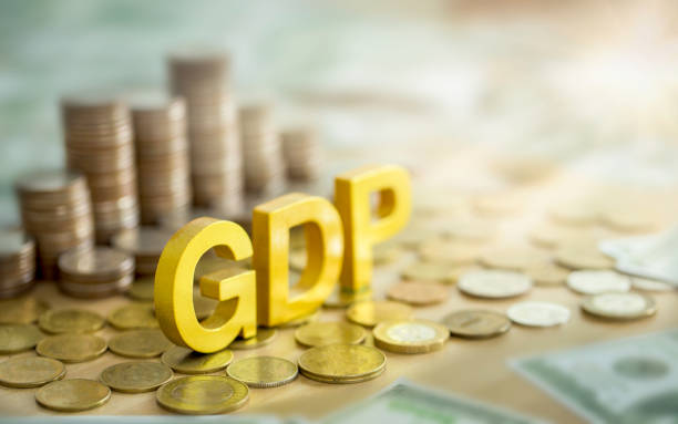 Concepts of monetary policy, GDP, management, economy, inflation. The main business involves domestic products, the background is a pile of coins and up and down arrow symbols. Concepts of monetary policy, GDP, management, economy, inflation. The main business involves domestic products, the background is a pile of coins and up and down arrow symbols. gdp stock pictures, royalty-free photos & images