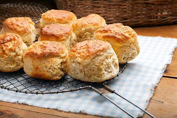 Freshly baked scones Scones cooling on a wire rack scone photos stock pictures, royalty-free photos & images