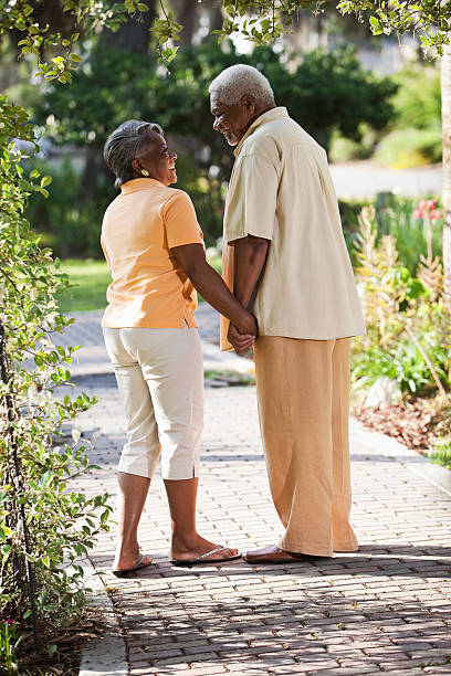 istock Senior African American couple holding hands 171285540