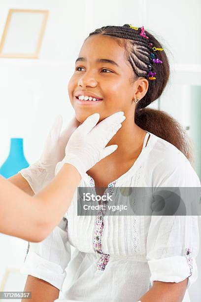 Early Teenage Girl Visit Doctor Stock Photo - Download Image Now - Doctor, Multiracial Group, Teenager