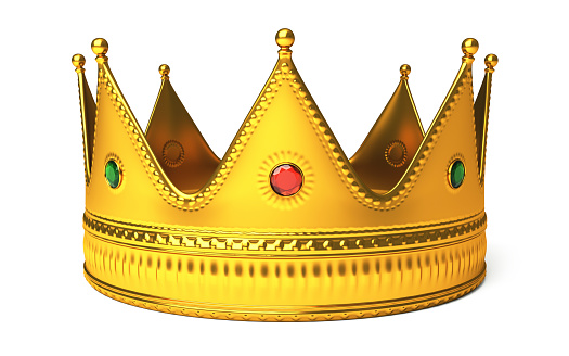 Gold crown with precious gems on it.